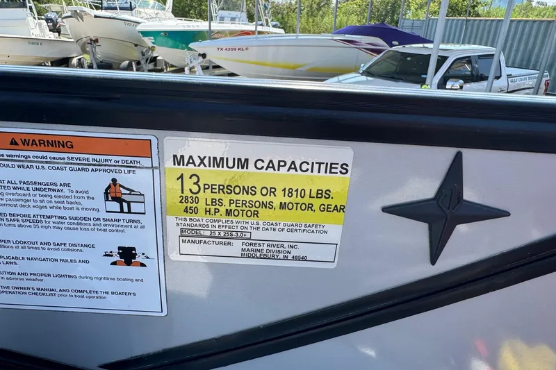 Slide: The Image of Berkshire 250 Super-Sport Premium 2021 boat capacity label, 13 persons, 2830 lbs, 450 HP motor. - 21