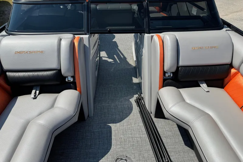 Slide: The Image of 2021 Berkshire 250 Super-Sport Premium boat interior with gray and orange seating. - 29
