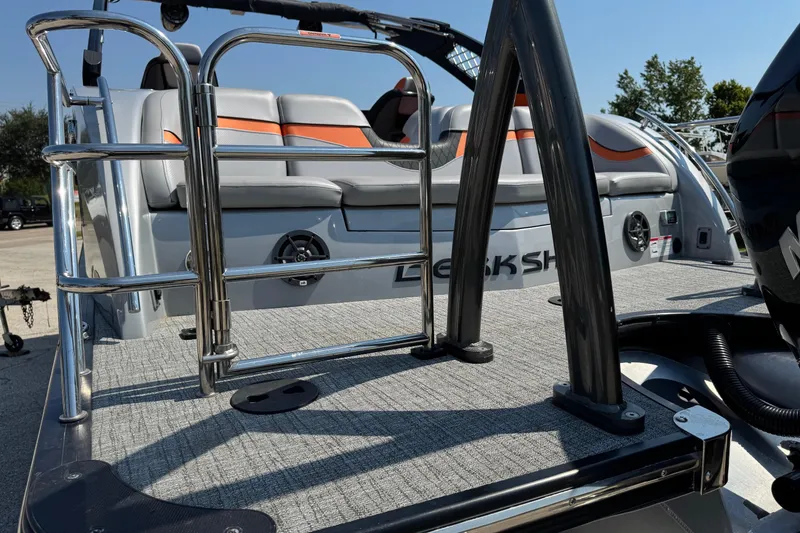 Slide: The Image of 2021 Berkshire 250 Super-Sport Premium boat with sleek seating and stainless steel railings. - 7