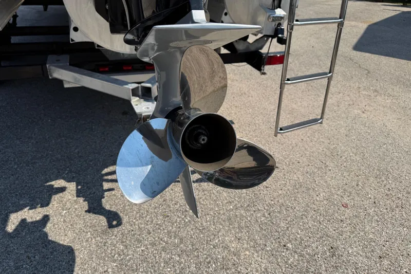 Slide: The Image of Propeller of 2021 Berkshire 250 Super-Sport Premium boat on trailer. - 9