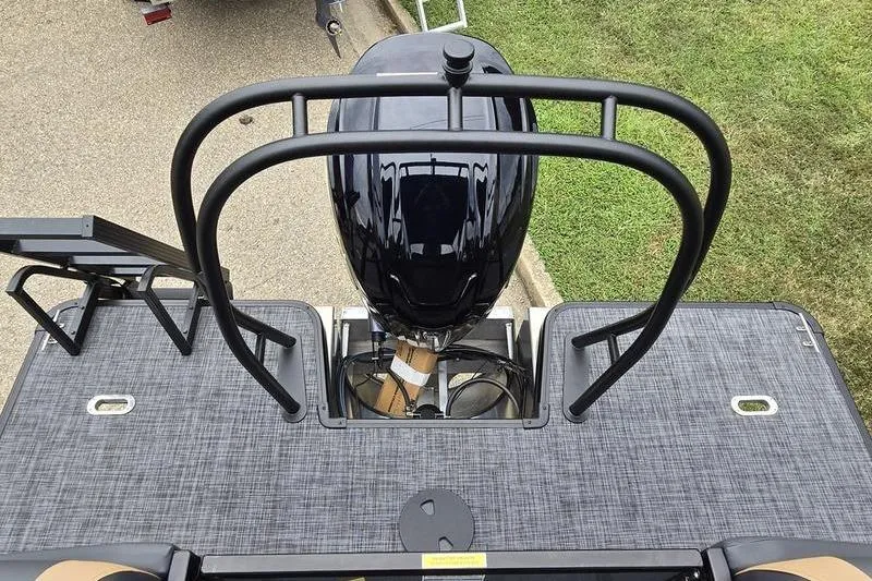 Slide: The Image of 2026 Godfrey SWEETWATER 2286 SB boat with motor and railing, viewed from above. - 15
