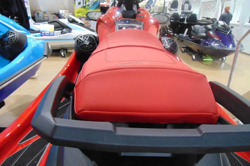 Slide: The Image of 2026 Yamaha WaveRunner GP SVHO with red seat, showcased indoors. - 8
