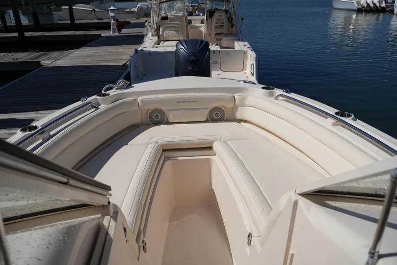 Slide: The Image of 2019 Grady-White Freedom 235 boat interior with spacious seating and sleek design. - 30
