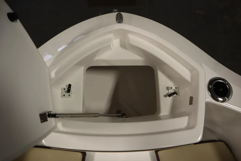 Slide: The Image of Open storage compartment on 2026 Yamaha Boats 252 FSH Sport. - 12