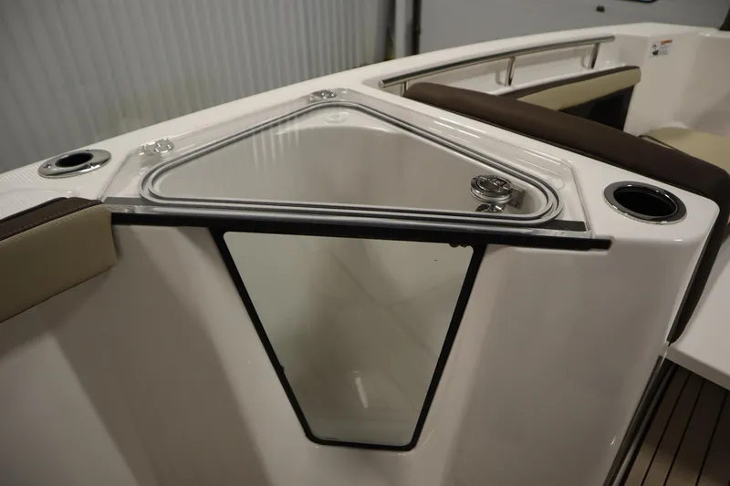 Slide: The Image of 2026 Yamaha Boats 252 FSH Sport interior detail with seating and storage compartment. - 15