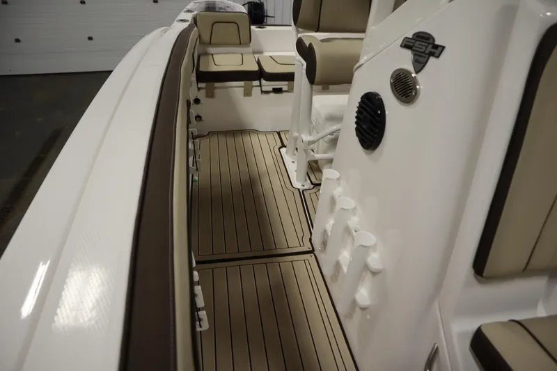 Slide: The Image of 2026 Yamaha Boats 252 FSH Sport interior with sleek seating and modern design. - 19
