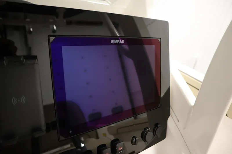 Slide: The Image of Simrad display on 2026 Yamaha Boats 252 FSH Sport dashboard. - 25