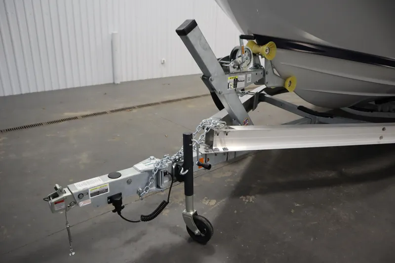 Slide: The Image of 2026 Yamaha Boats 252 FSH Sport trailer hitch in a garage setting. - 42