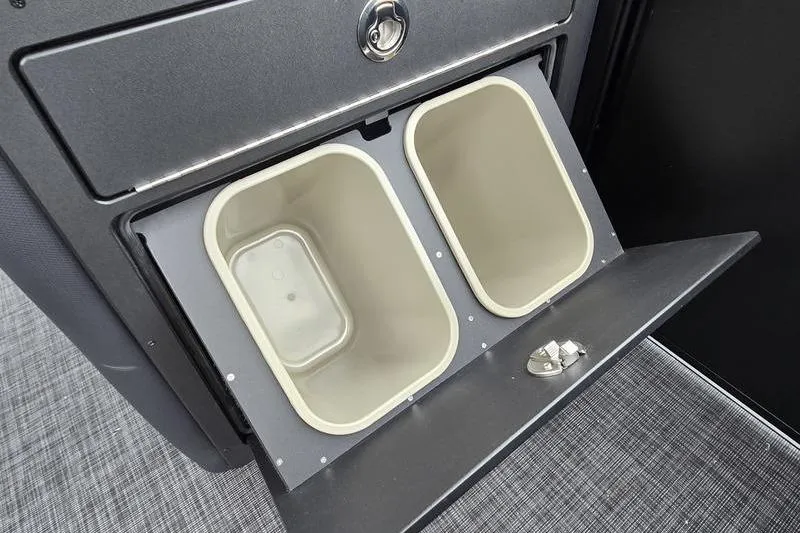 Slide: The Image of Dual storage bins in 2026 Godfrey SWEETWATER 2286 SB boat interior. - 16