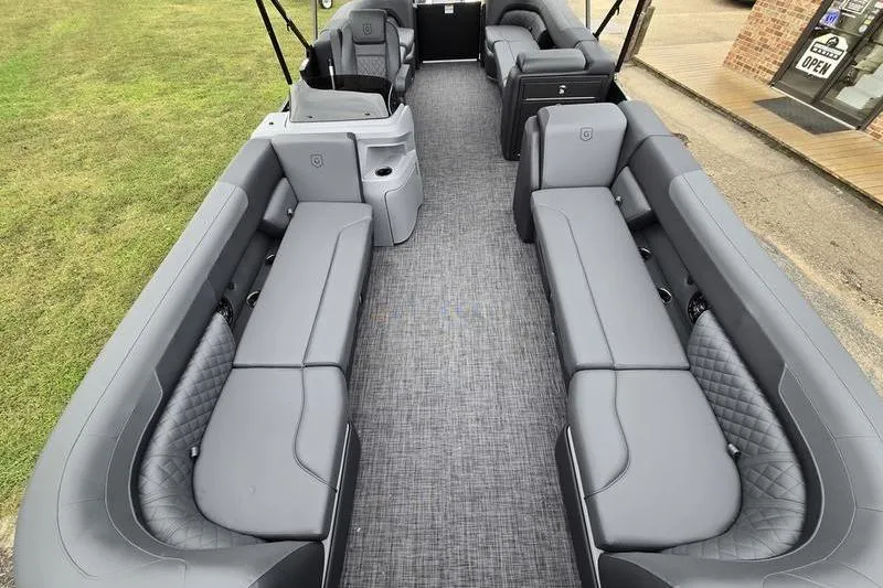 Slide: The Image of 2026 Godfrey SWEETWATER 2286 SB pontoon boat with spacious gray seating and modern design. - 2