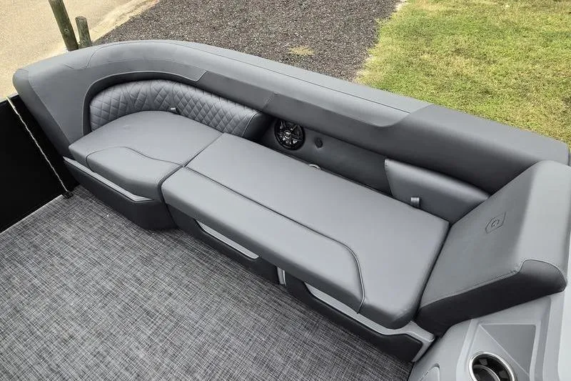 Slide: The Image of 2026 Godfrey SWEETWATER 2286 SB boat interior with sleek gray seating and modern design. - 6