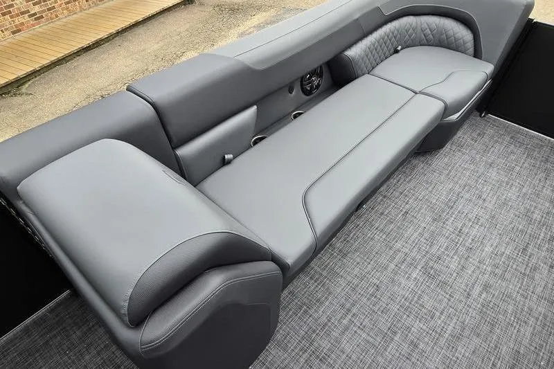 Slide: The Image of Luxurious seating on 2026 Godfrey SWEETWATER 2286 SB pontoon boat, featuring sleek gray upholstery. - 8