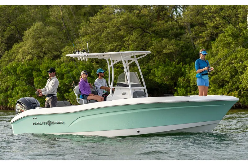 The Image of 2026 NauticStar 222 Offshore boat on trailer at Downeast Marine dealership. - 1