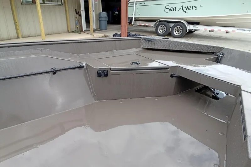 Slide: The Image of 2025 Alweld 1548 Invader boat with 40 HP outboard motor on trailer. - 11