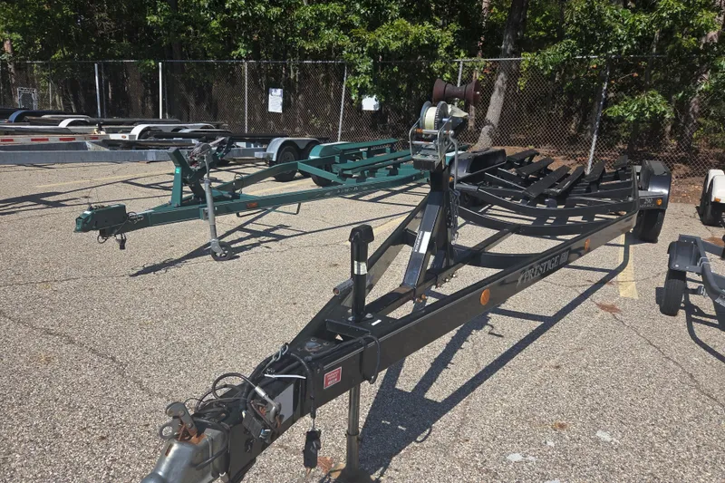 Slide: The Image of Boat trailers parked on asphalt, suitable for 2006 Sea Ray 290 Select EX. - 15