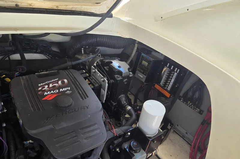 Slide: The Image of Engine compartment of 2006 Sea Ray 290 Select EX with MerCruiser 350 MAG MPI engine. - 34