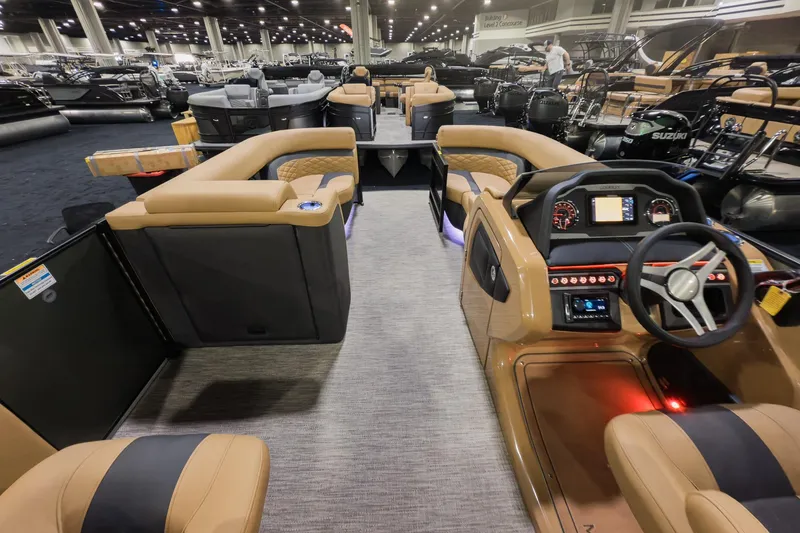 Slide: The Image of Luxurious 2026 Godfrey Monaco 235 Split Bench boat interior with modern dashboard and seating. - 18