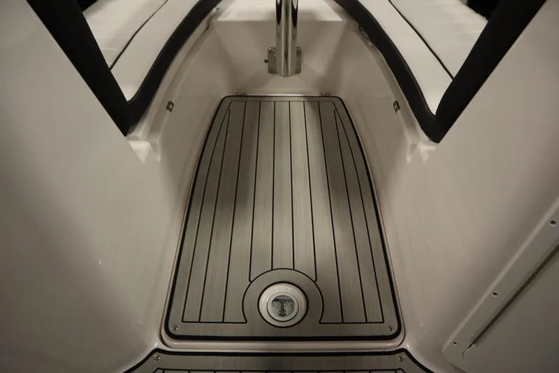 Slide: The Image of 2026 Yamaha Boats 255 FSH Sport E interior with sleek, modern flooring design. - 16