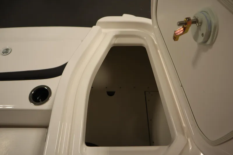 Slide: The Image of Storage compartment of 2026 Yamaha Boats 255 FSH Sport E, featuring sleek design and functionality. - 43