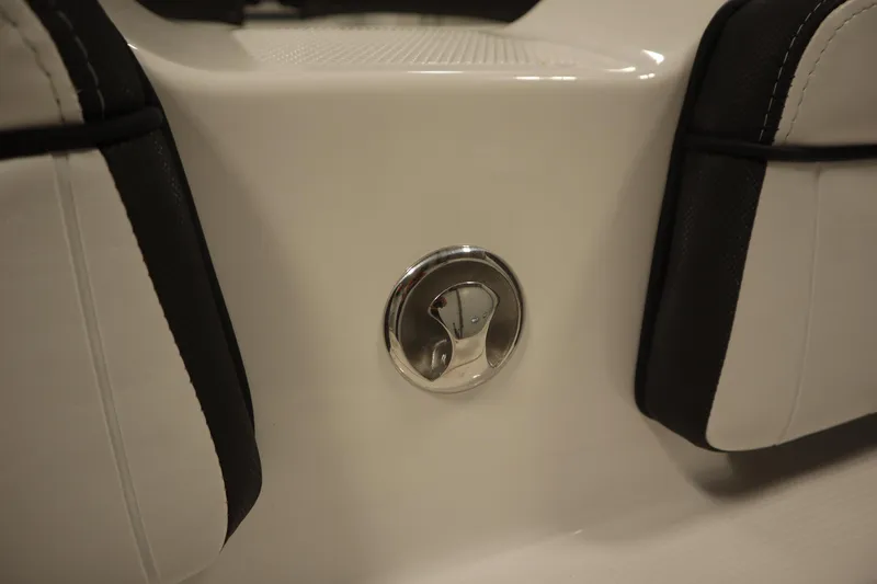 Slide: The Image of 2026 Yamaha Boats 255 FSH Sport E interior detail with chrome fixture. - 49