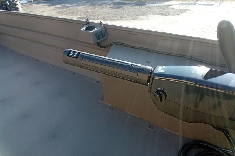 Slide: The Image of 2025 Alweld 1648VV Marsh boat interior with steering handle and control panel. - 13