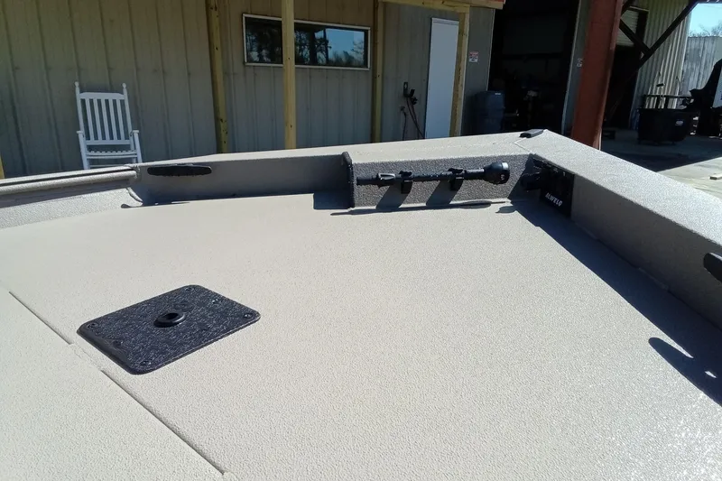Slide: The Image of 2025 Alweld 1648VV Marsh boat deck with rod holders and textured surface. - 17
