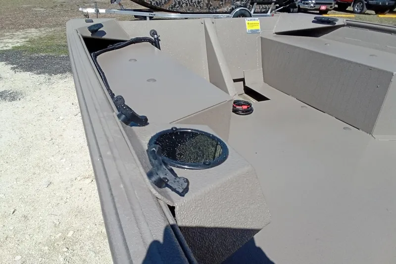 Slide: The Image of 2025 Alweld 1648VV Marsh boat interior, showcasing seating and storage compartments. - 19