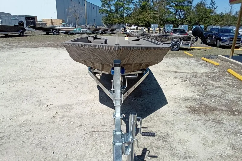 Slide: The Image of 2025 Alweld 1648VV Marsh boat on trailer in outdoor lot. - 25