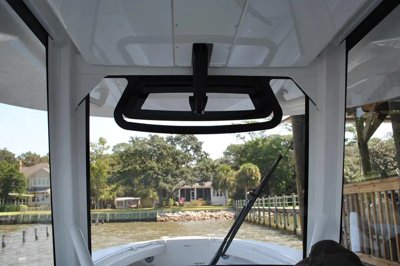 Slide: The Image of 2025 Regulator 34 Center Console boat interior with waterfront view. - 35