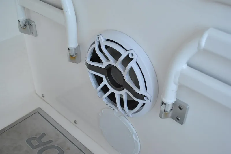 Slide: The Image of 2025 Regulator 34 Center Console boat speaker and railing detail. - 44