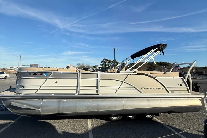 Slide: The Image of 2026 Berkshire 23RFX STS pontoon boat parked under clear blue sky. - 30