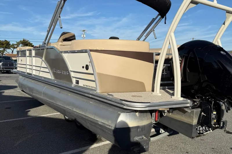 Slide: The Image of 2026 Berkshire 23RFX STS pontoon boat, saltwater edition, parked outdoors. - 31