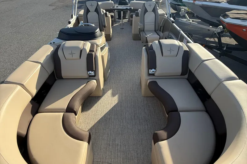 Slide: The Image of 2026 Berkshire 23RFX STS pontoon boat interior with luxurious seating and modern design. - 34