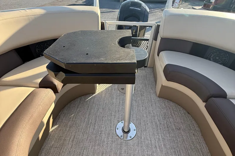Slide: The Image of 2026 Berkshire 23RFX STS pontoon boat interior with seating and table. - 41