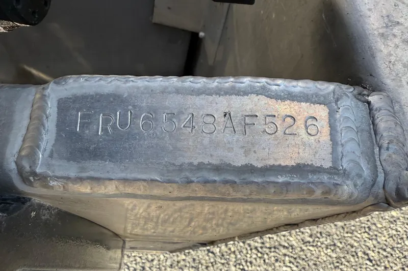 Slide: The Image of Close-up of a metal part with the serial number FRU6548AF526, Berkshire 23RFX STS 2026. - 43