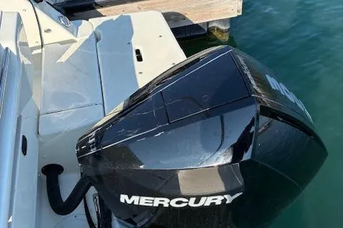 Slide: The Image of 2024 Bayliner Trophy T25 Explorer with Mercury outboard engine at dock. - 8