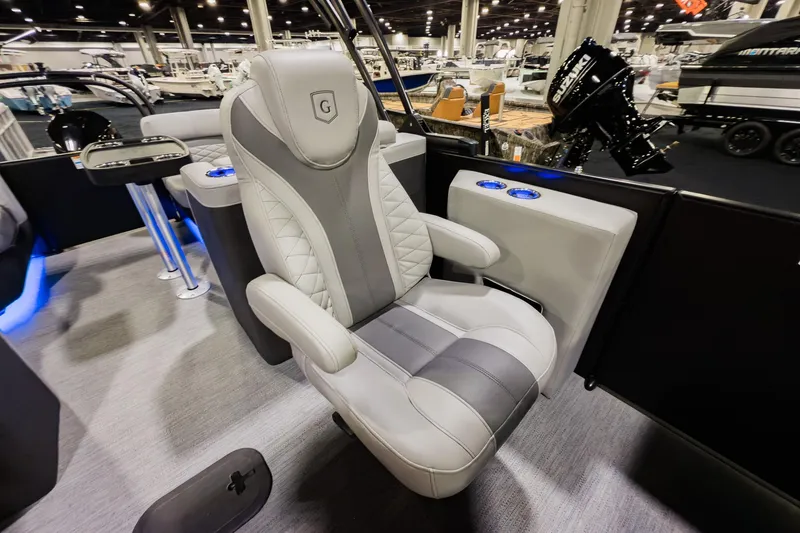 Slide: The Image of 2026 Godfrey Monaco 235 Split Bench boat interior with luxurious seating and modern design. - 14
