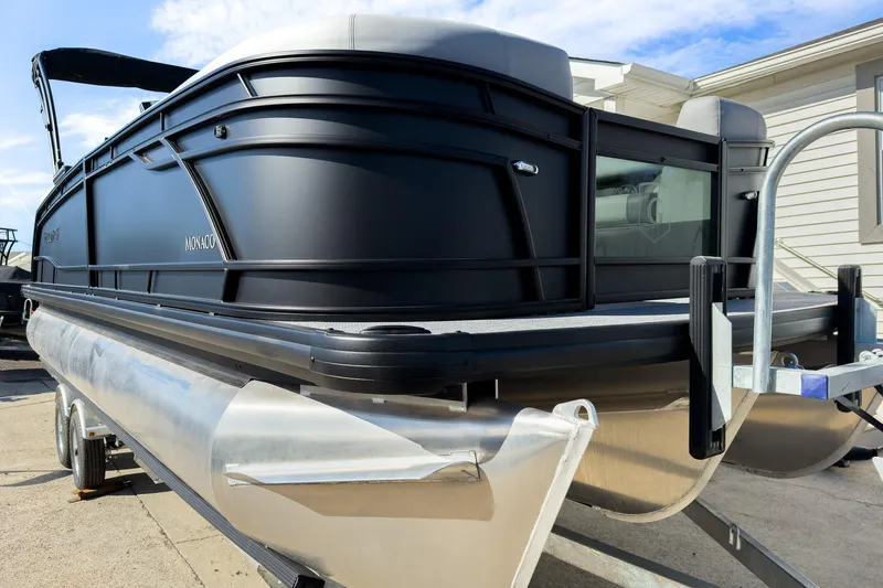 Slide: The Image of 2026 Godfrey Monaco 235 Split Bench pontoon boat on trailer, side view. - 32