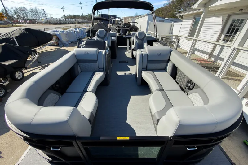 Slide: The Image of 2026 Godfrey Monaco 235 Split Bench pontoon boat with luxurious seating and modern design. - 35