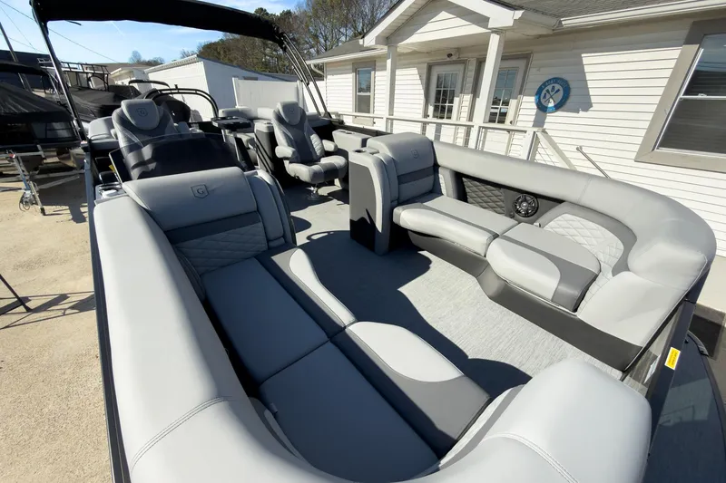 Slide: The Image of 2026 Godfrey Monaco 235 Split Bench pontoon boat with luxurious seating and modern design. - 36