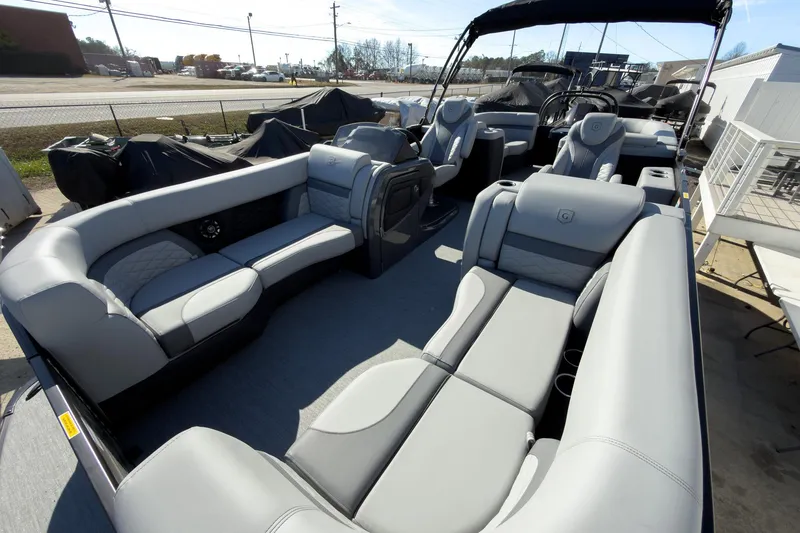 Slide: The Image of 2026 Godfrey Monaco 235 Split Bench pontoon boat with luxurious seating and modern design. - 37