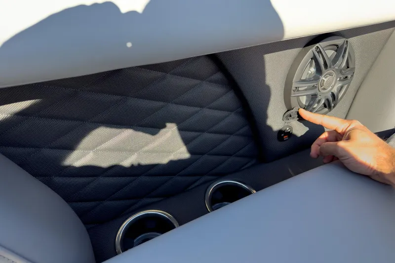 Slide: The Image of Interior of 2026 Godfrey Monaco 235 boat with speaker and cup holders. - 40