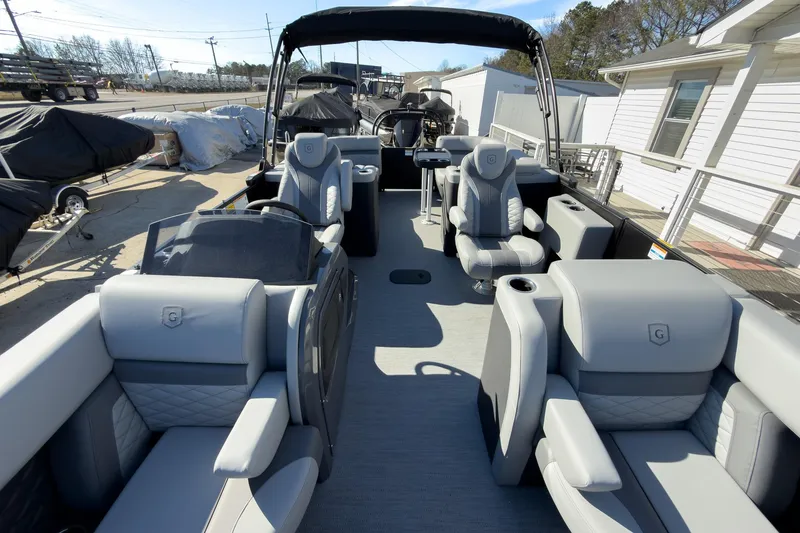 Slide: The Image of 2026 Godfrey Monaco 235 Split Bench pontoon boat with luxurious seating and modern design. - 43
