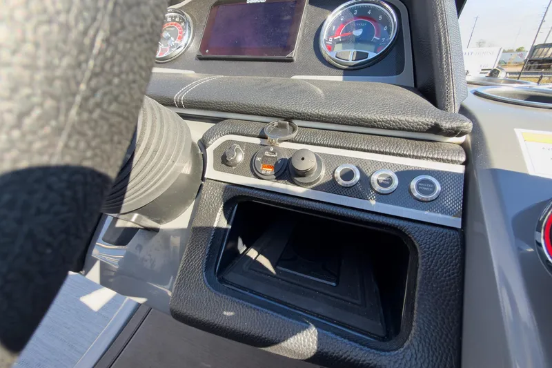 Slide: The Image of Dashboard of 2026 Godfrey Monaco 235 Split Bench boat with controls and gauges. - 55