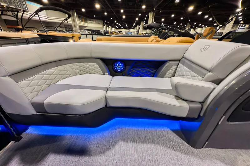 Slide: The Image of Luxurious seating on 2026 Godfrey Monaco 235 Split Bench with ambient blue lighting. - 6