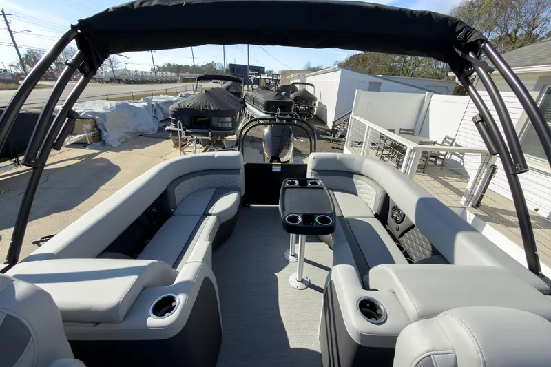 Slide: The Image of 2026 Godfrey Monaco 235 Split Bench pontoon boat with spacious seating and modern design. - 62