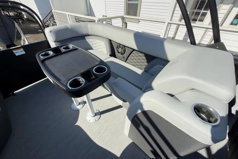 Slide: The Image of 2026 Godfrey Monaco 235 Split Bench interior with sleek seating and cupholders. - 63