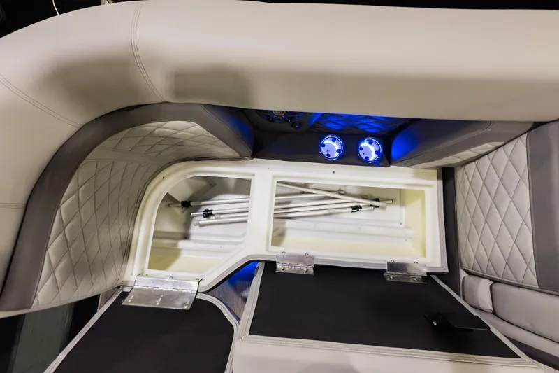 Slide: The Image of Luxurious interior of 2026 Godfrey Monaco 235 Split Bench boat with illuminated storage. - 7