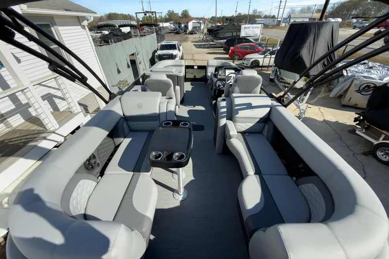 Slide: The Image of 2026 Godfrey Monaco 235 Split Bench pontoon boat with luxurious seating and modern design. - 71