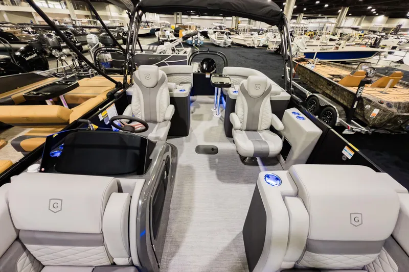 Slide: The Image of 2026 Godfrey Monaco 235 Split Bench boat interior with luxurious seating and modern design. - 8